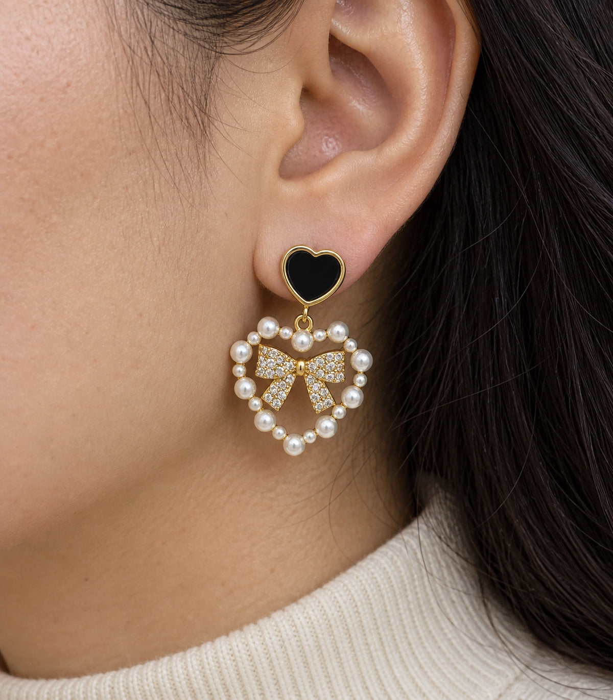 JIMIKI Heart Pearl Bow Drop Earring Pair in Gold Tone / Black, close-up detail #color_gold tone / black