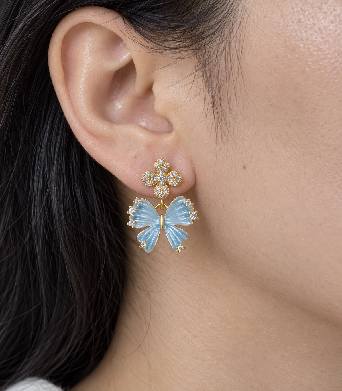 JIMIKI Butterfly Crystal Flower Drop Earring Pair in Gold tone / Blue, close-up detail #color_gold tone / blue