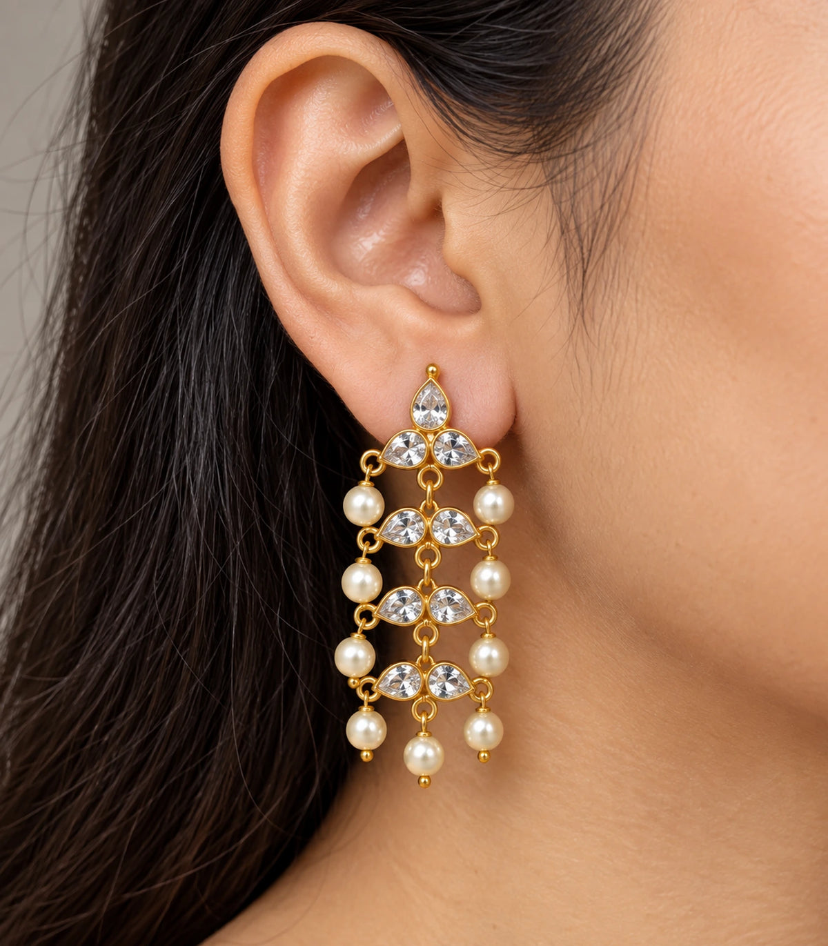 JIMIKI Gold Tone clear-crystal pearl chandelier earrings, worn on the ear #color_gold-tone