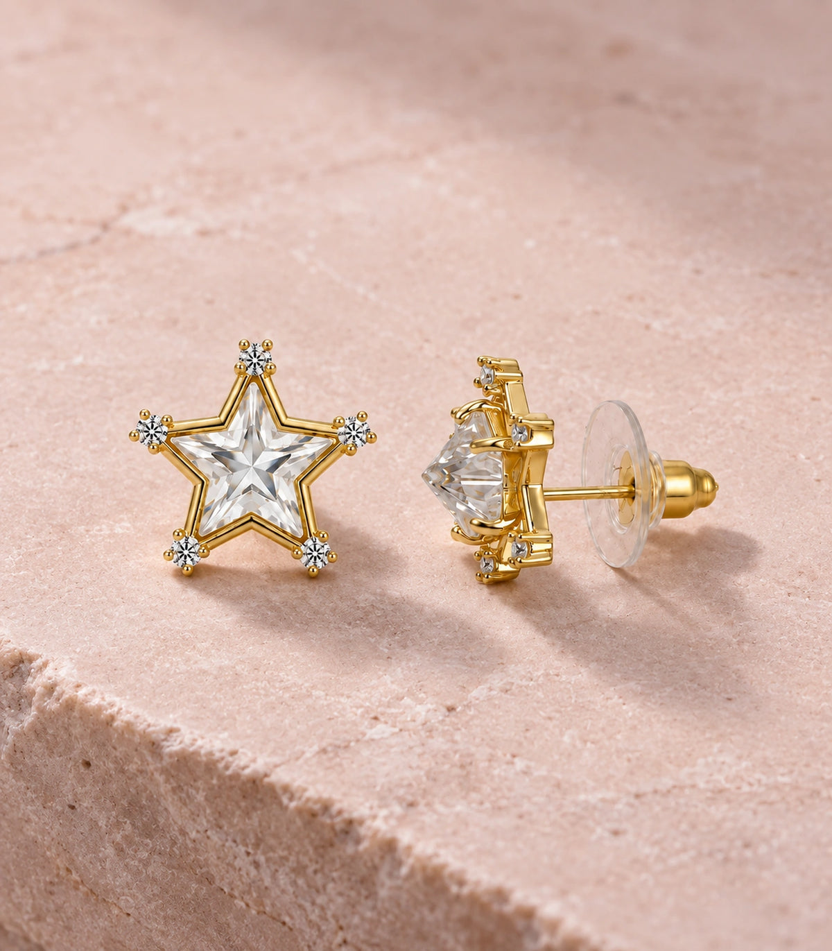 JIMIKI Crystal Star Stud Earring Pair in Gold tone, editorial flat lay #color_gold tone