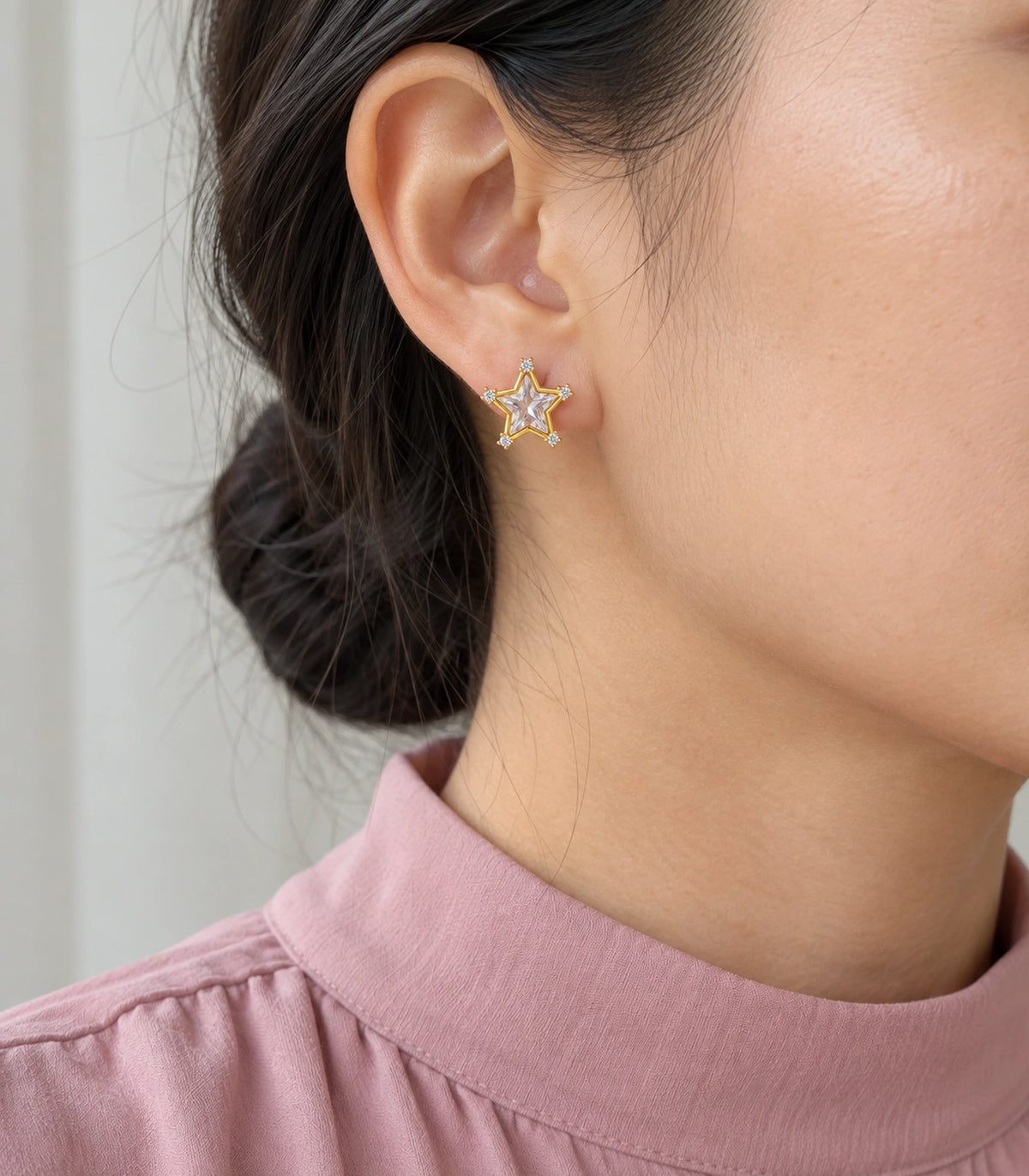 JIMIKI Crystal Star Stud Earring Pair in Gold tone, model wearing view #color_gold tone