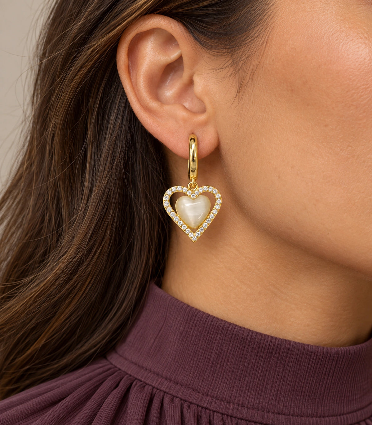 JIMIKI Heart Crystal Frame Drop Hoop Earring Pair in Gold-tone / Cream, model wearing view #color_gold-tone / cream