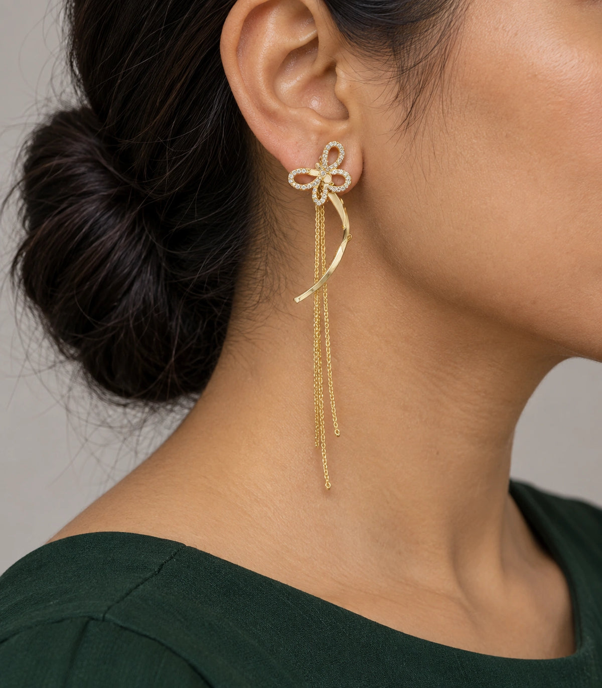 JIMIKI Butterfly Ribbon Chain Drop Earrings in Gold-tone, model wearing view #color_gold-tone