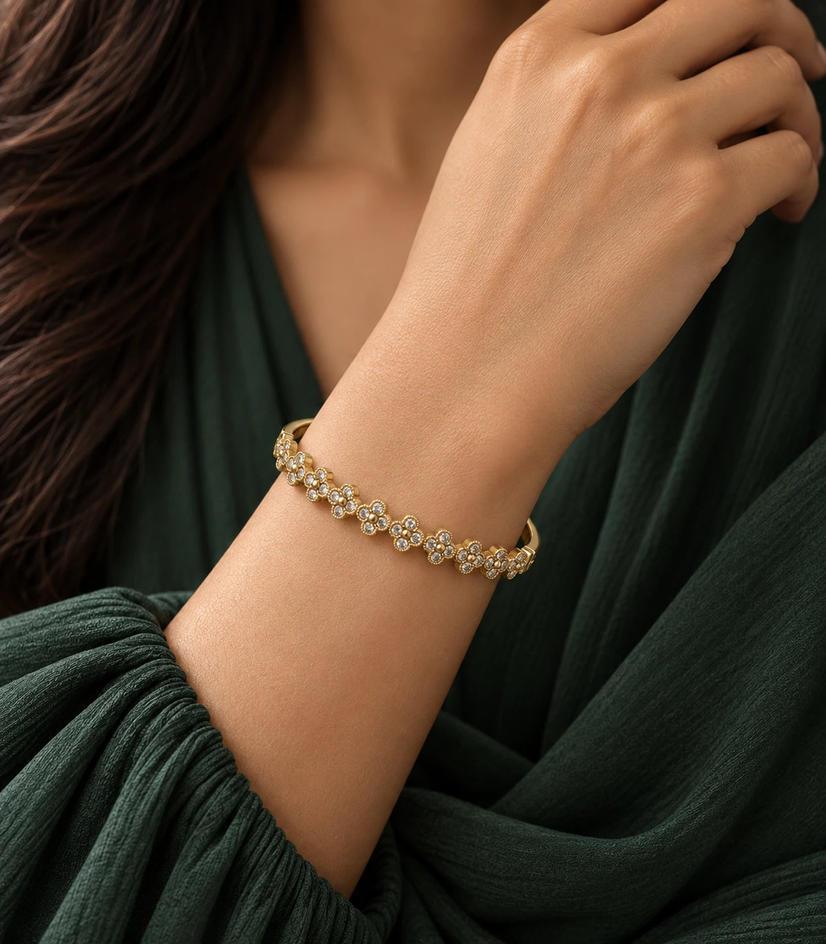 JIMIKI Gold-Tone Crystal Clover Row Bangle — bangle styled with an outfit #color_gold-tone / clear