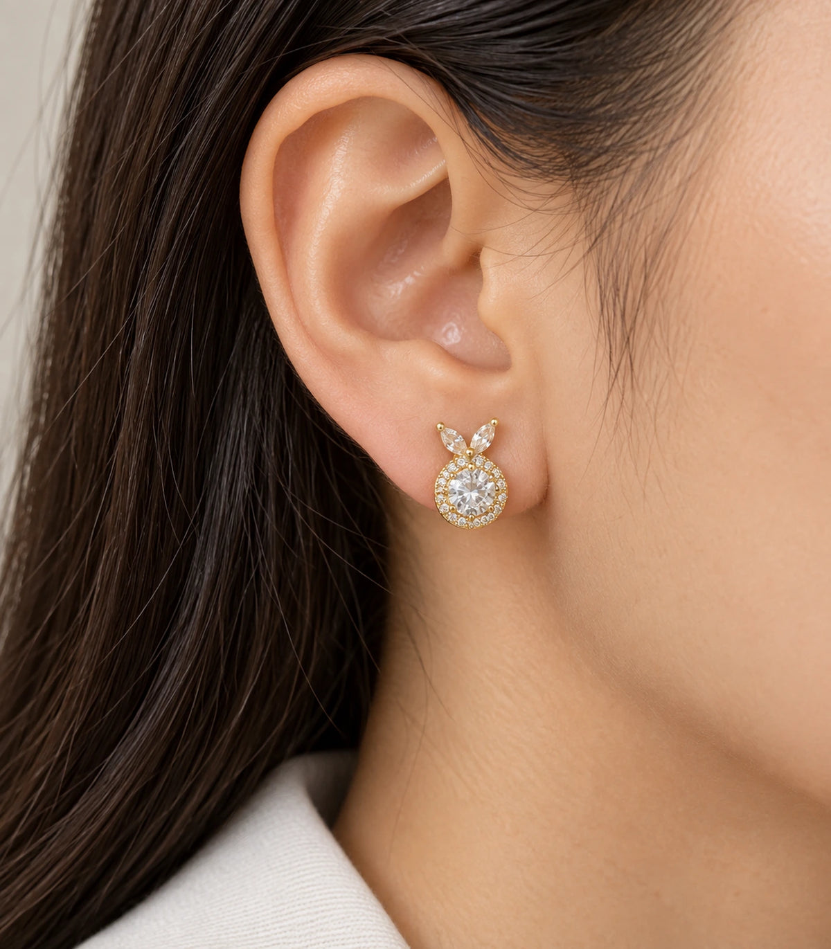 JIMIKI Crystal Halo Leaf Stud Earrings in Gold Tone - model #color_gold-tone