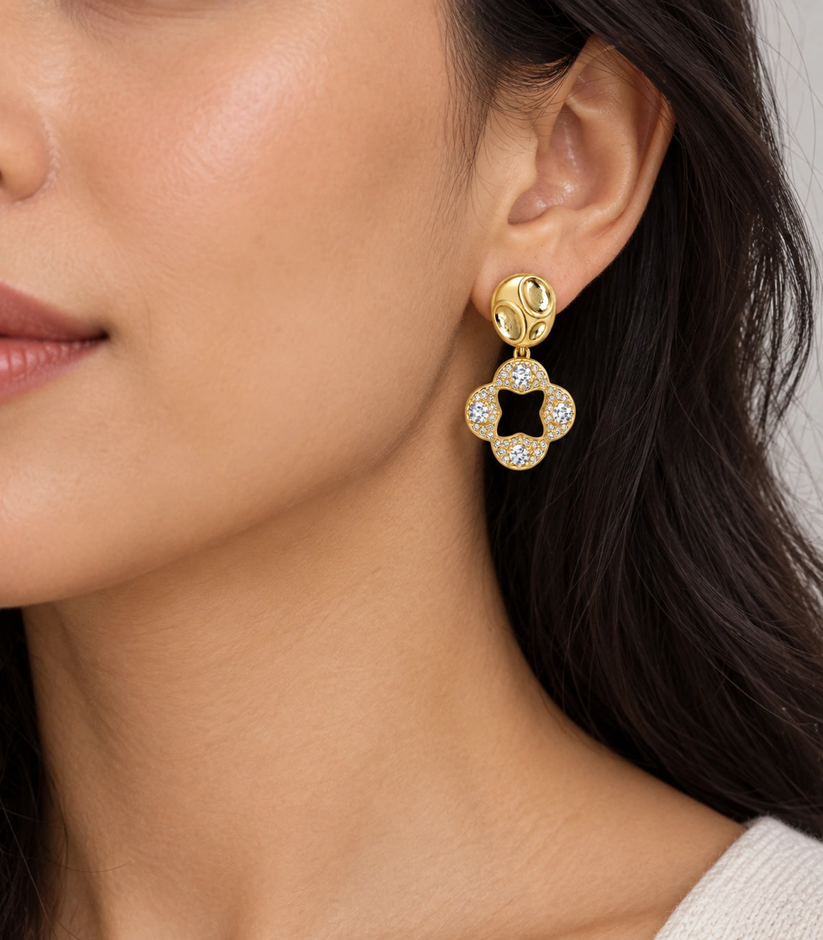 JIMIKI Gold-Tone Crystal Open Quatrefoil Organic Pebble Drop Earrings in Gold / Clear, model wearing view