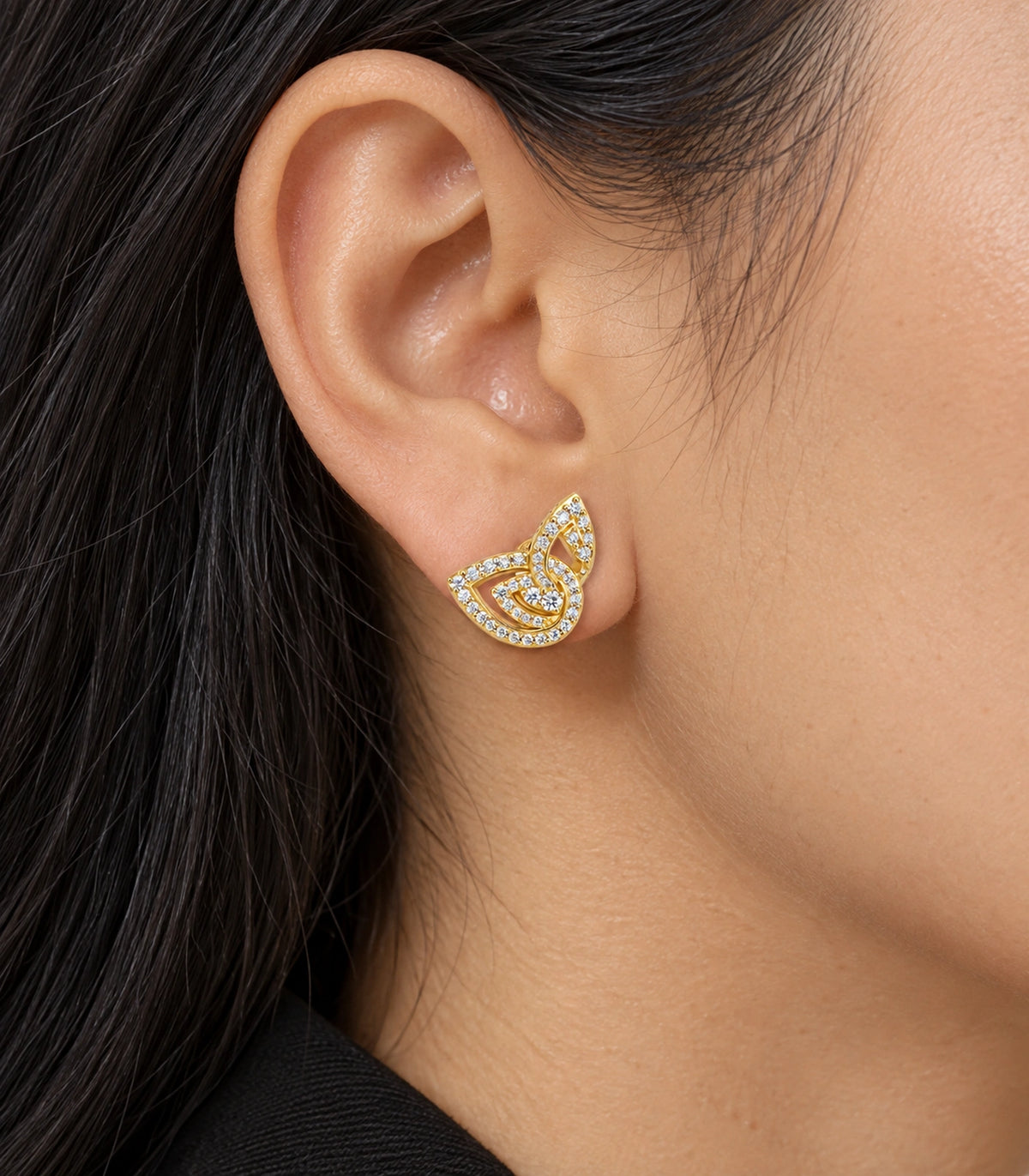 JIMIKI Crystal Open Swirl Stud Earring Pair in Gold tone, close-up detail #color_gold tone