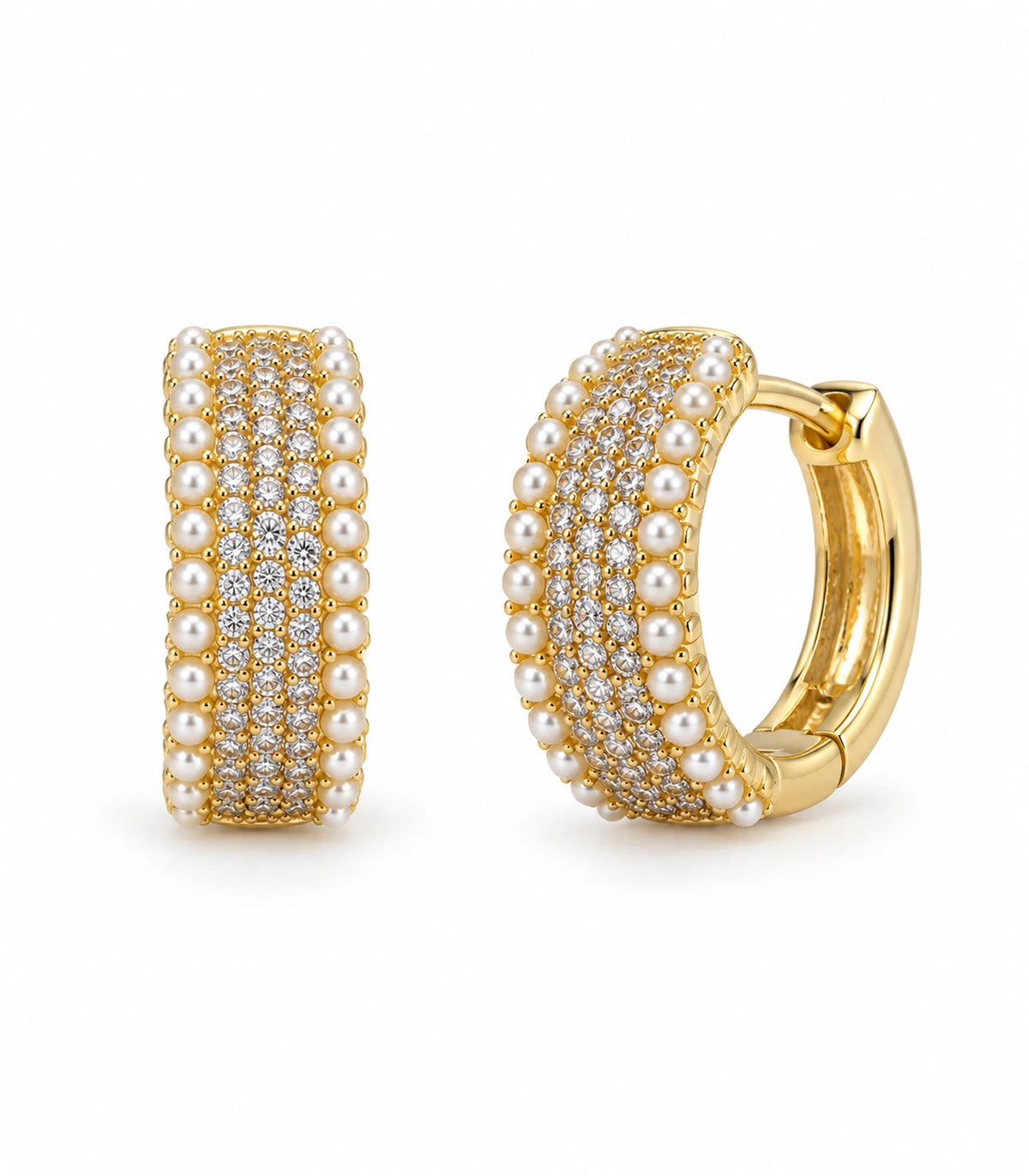 Pair of gold-tone crystal-style and white pearl-style border huggie hoop earrings on white