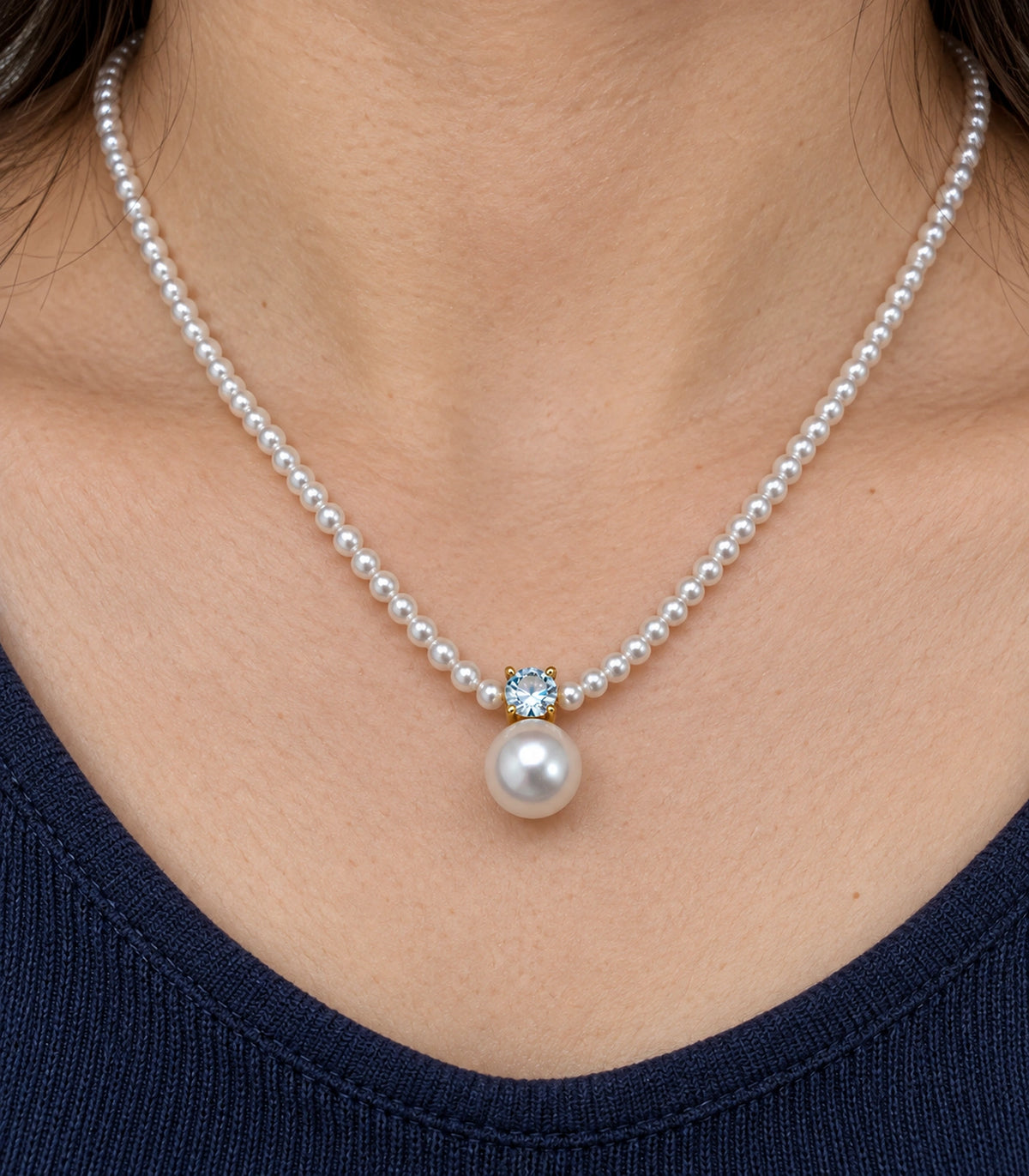 JIMIKI Gold Tone Crystal Pearl Drop Beaded Necklace in Gold tone / white, close-up detail