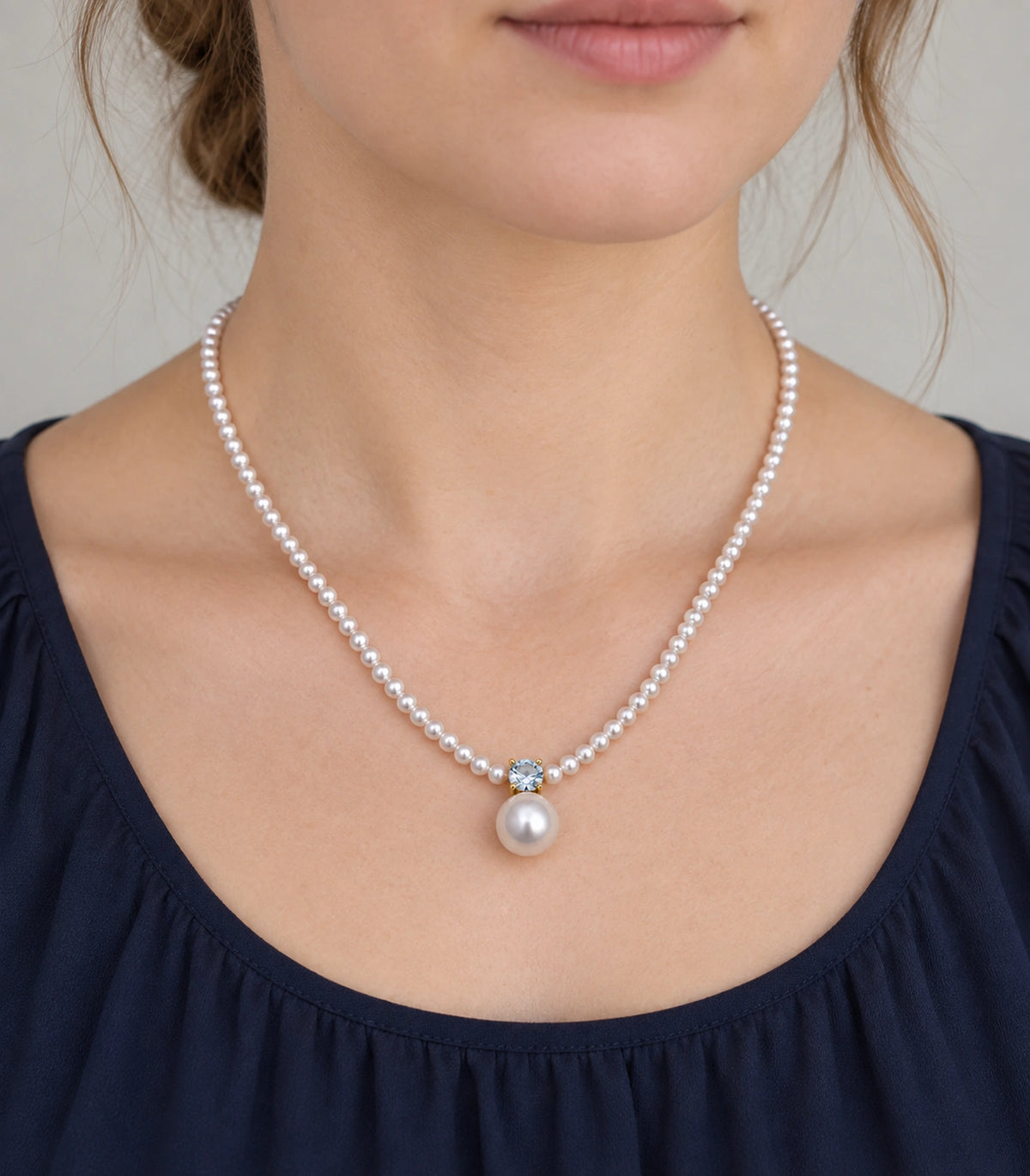 JIMIKI Gold Tone Crystal Pearl Drop Beaded Necklace in Gold tone / white, model wearing view