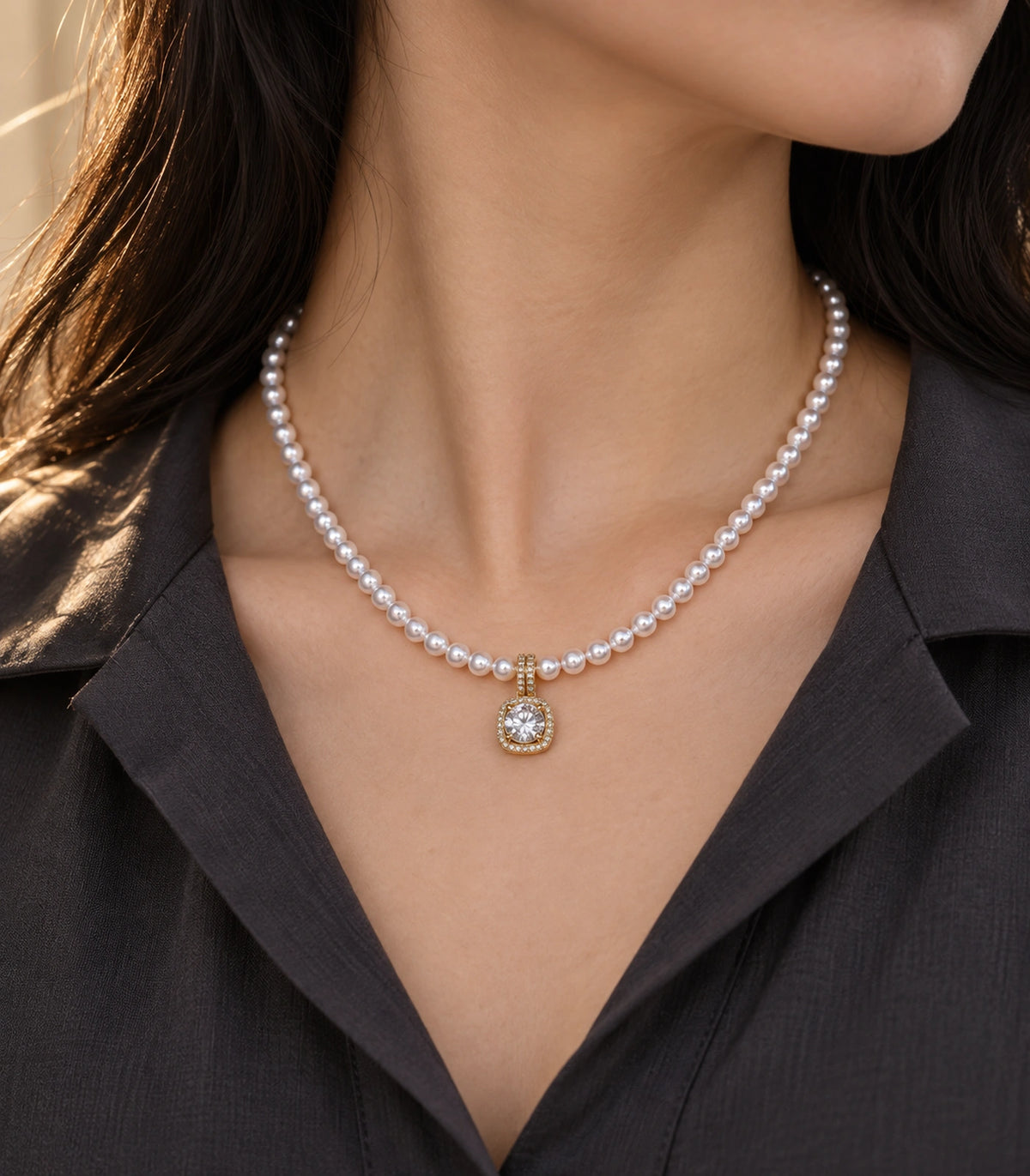 JIMIKI Gold Tone Cushion Halo Crystal Pearl Style Necklace in Gold tone / white, editorial model view