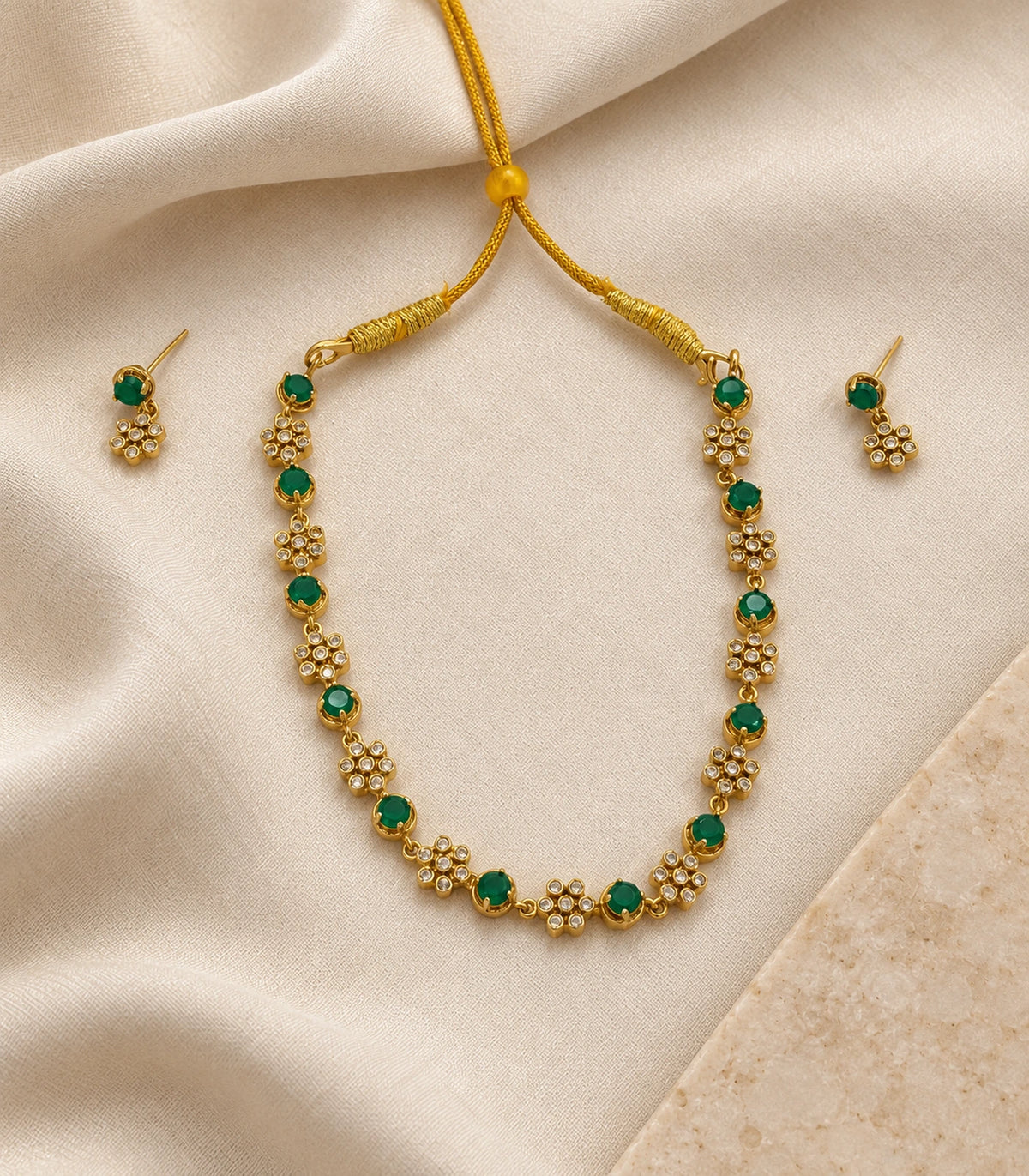 Crystal Floral Necklace Set in Emerald, editorial flat lay view #Color_Emerald
