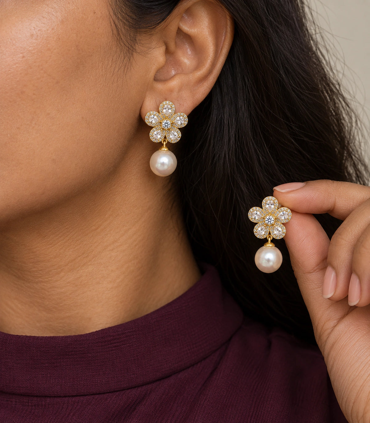JIMIKI Five Petal Crystal Flower Pearl Drop Earring Pair in Gold-tone, model wearing view #color_gold-tone