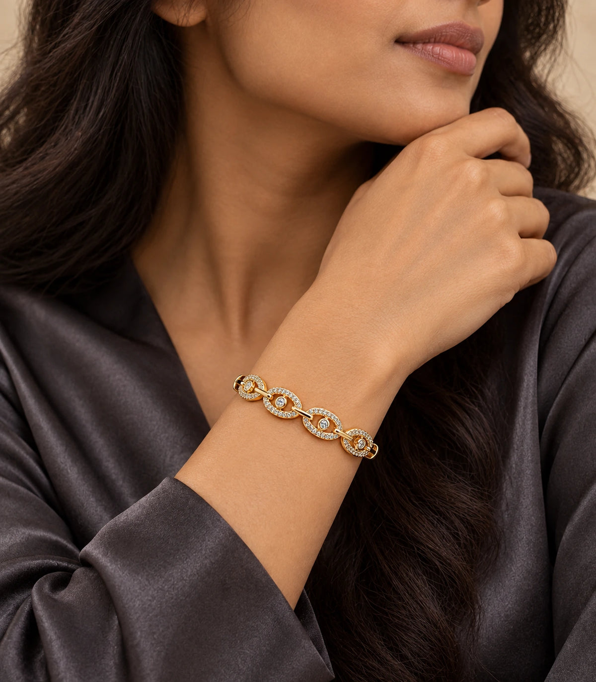 JIMIKI Gold-Tone Four Oval Halo Crystal Bangle — bangle styled with an outfit #color_gold-tone / clear