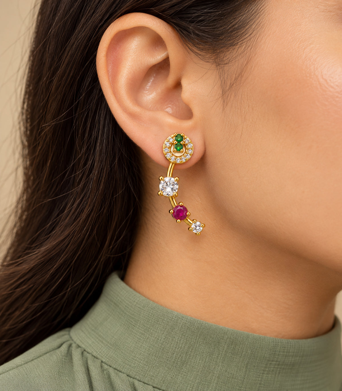 Gold-tone green and magenta curved crystal earrings - model view