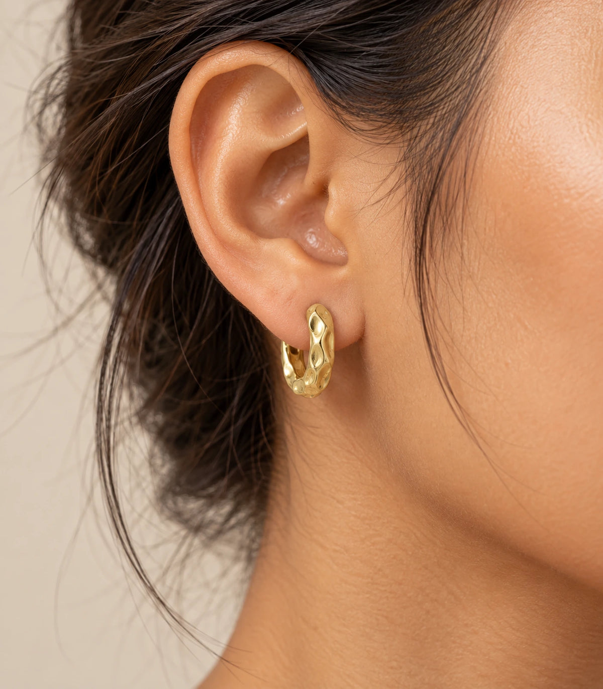JIMIKI Gold Tone Hammered Hoop Earrings, editorial worn view #color_gold-tone