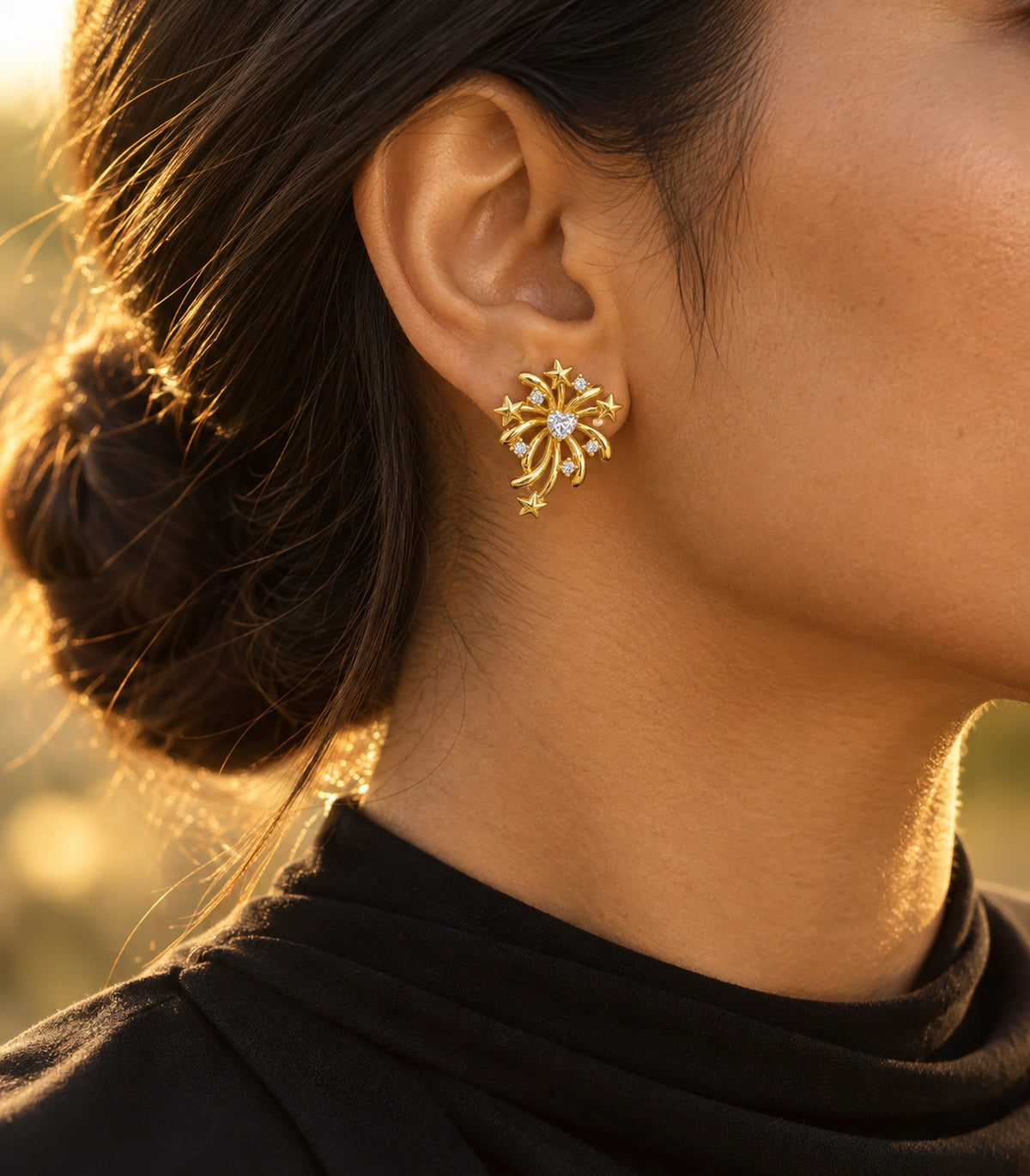 JIMIKI Heart Crystal Starburst Stud Earring Pair in Gold tone/Clear, editorial model view #color_gold tone/clear