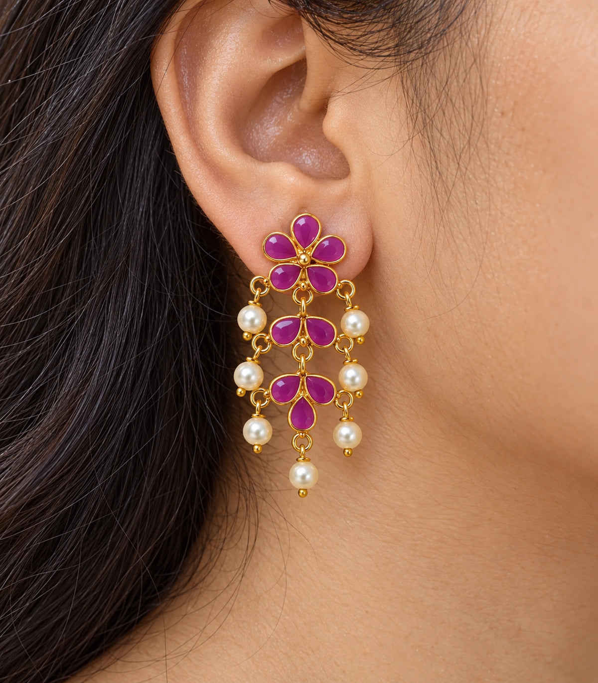 JIMIKI magenta floral pearl-style chandelier earrings, worn closeup detail #color_magenta