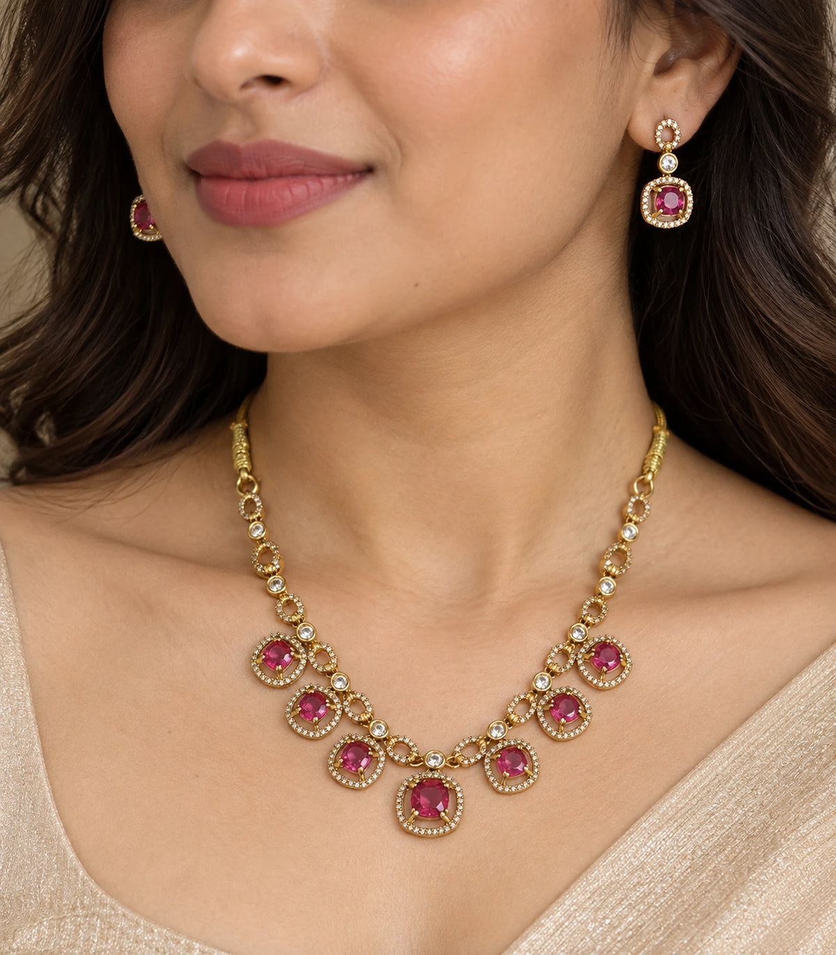 Round Crystal Teardrop Necklace Set in Magenta with gold-tone finish, closeup worn view #Color_Magenta