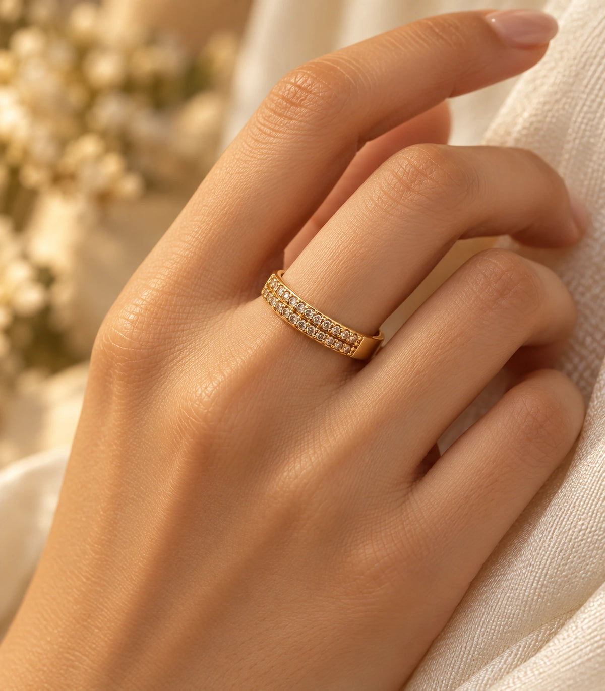 JIMIKI Gold Tone Multi Row Crystal Adjustable Ring in Gold Tone - editorial worn view #color_gold-tone