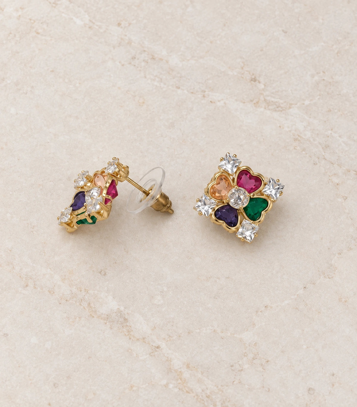 JIMIKI Gold-Tone Multicolour Heart Petal Stud Earrings — pair in a styled flat lay #color_gold-tone / multicolour