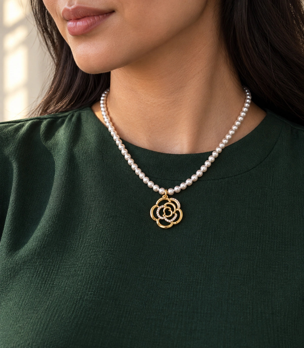 JIMIKI Gold Tone Openwork Rose Crystal Pearl Necklace in Gold / White, editorial model view