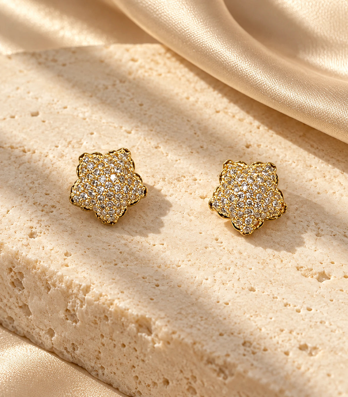 JIMIKI Gold Tone Pave Flower Stud Earrings - editorial-flatlay #color_gold-tone