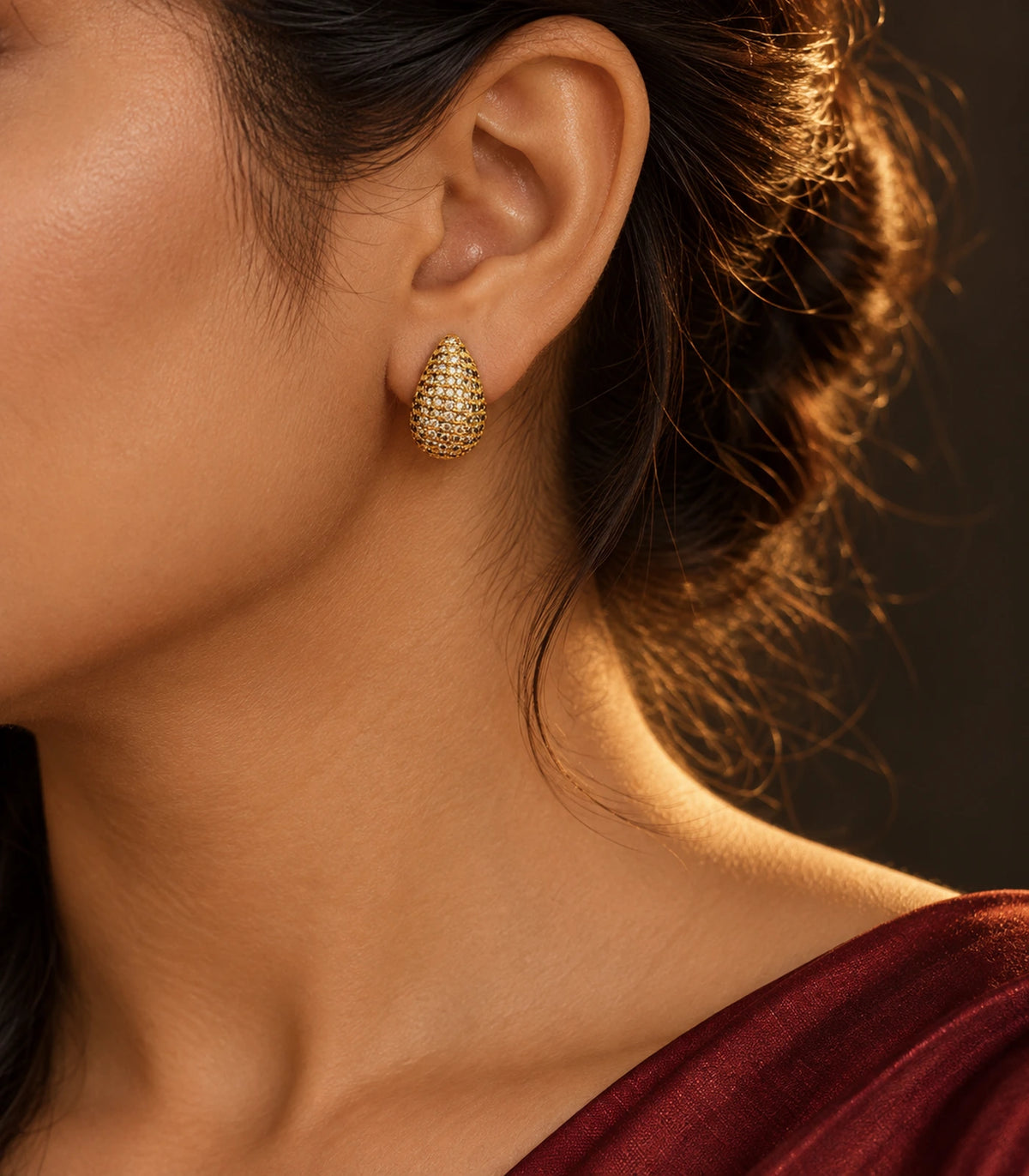 JIMIKI Gold Tone Pave Teardrop Stud Earrings - editorial-model #color_gold-tone