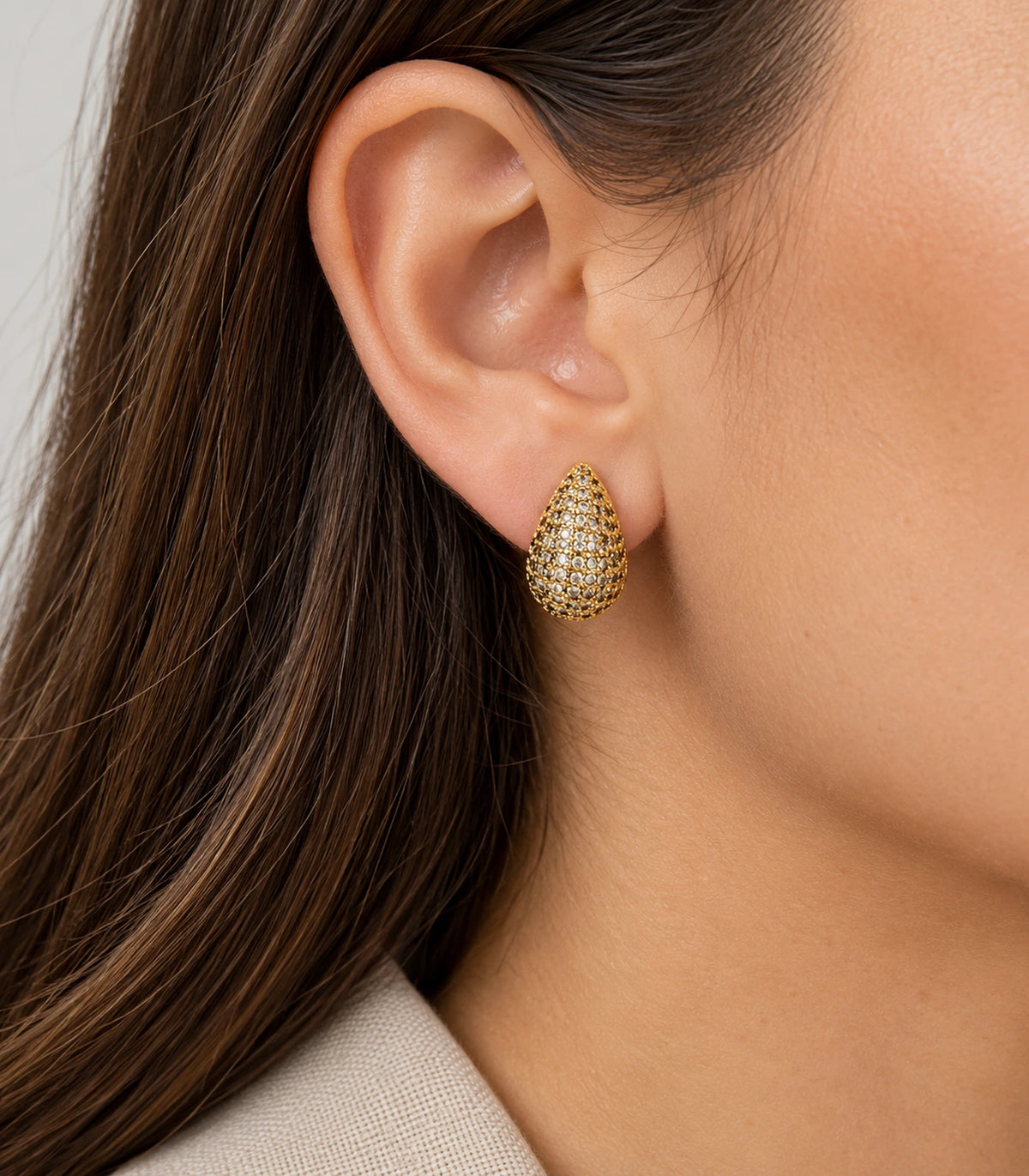 JIMIKI Gold Tone Pave Teardrop Stud Earrings - model #color_gold-tone