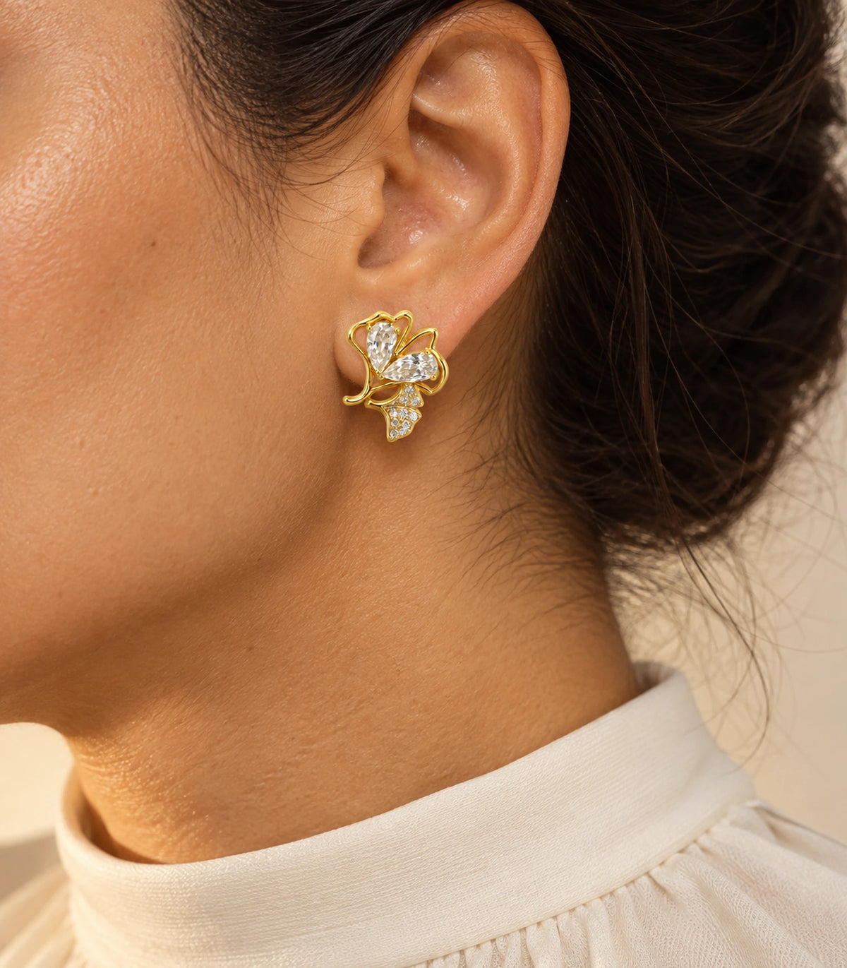 JIMIKI Pear Crystal Open Leaf Stud Earring Pair in Gold Tone, editorial model view #color_gold tone