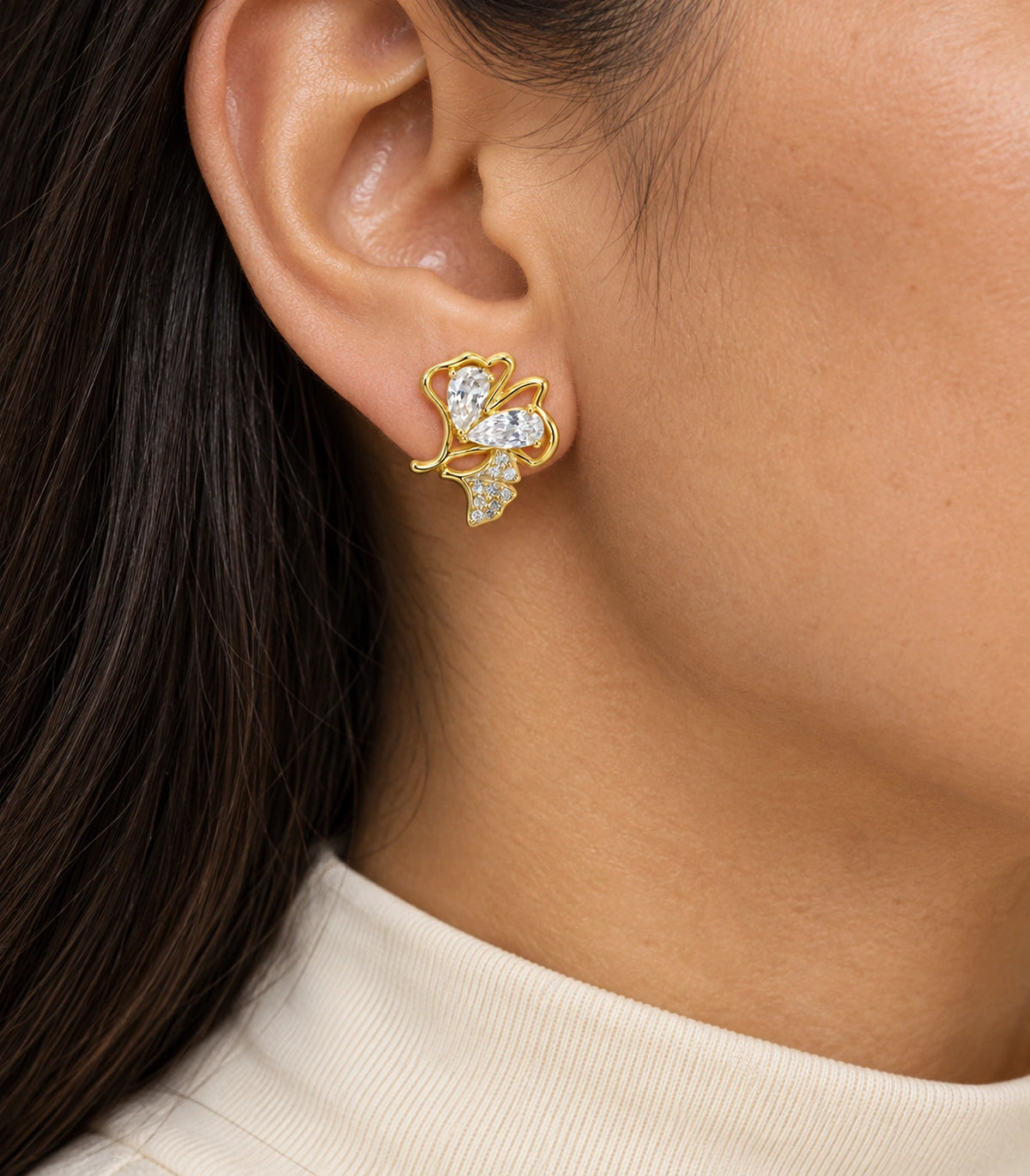 JIMIKI Pear Crystal Open Leaf Stud Earring Pair in Gold Tone, model wearing view #color_gold tone