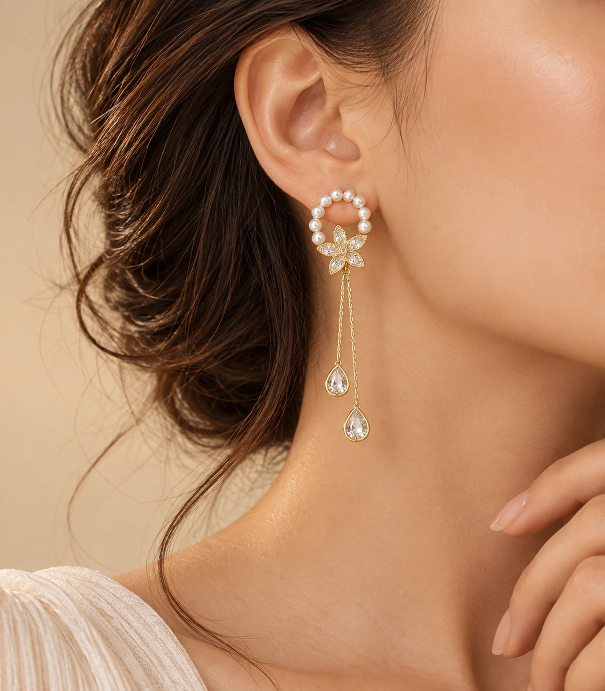 JIMIKI Gold-Tone Pearl Halo Flower Chain Drop Earrings — earrings styled with an outfit #color_gold-tone / white