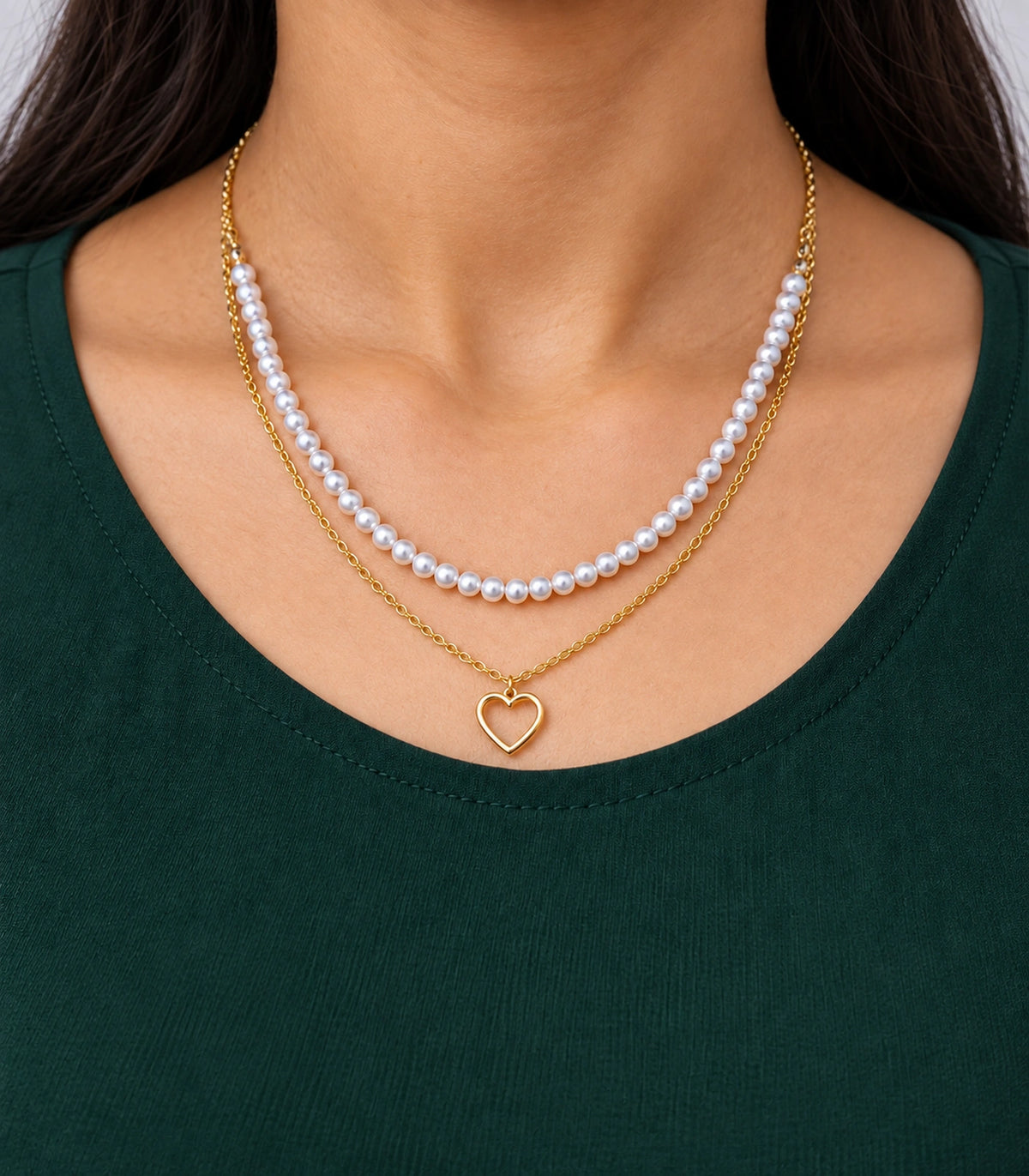 JIMIKI Gold-Tone Pearl Open-Heart Layered Necklace in Gold Tone - close-up details #color_gold-tone