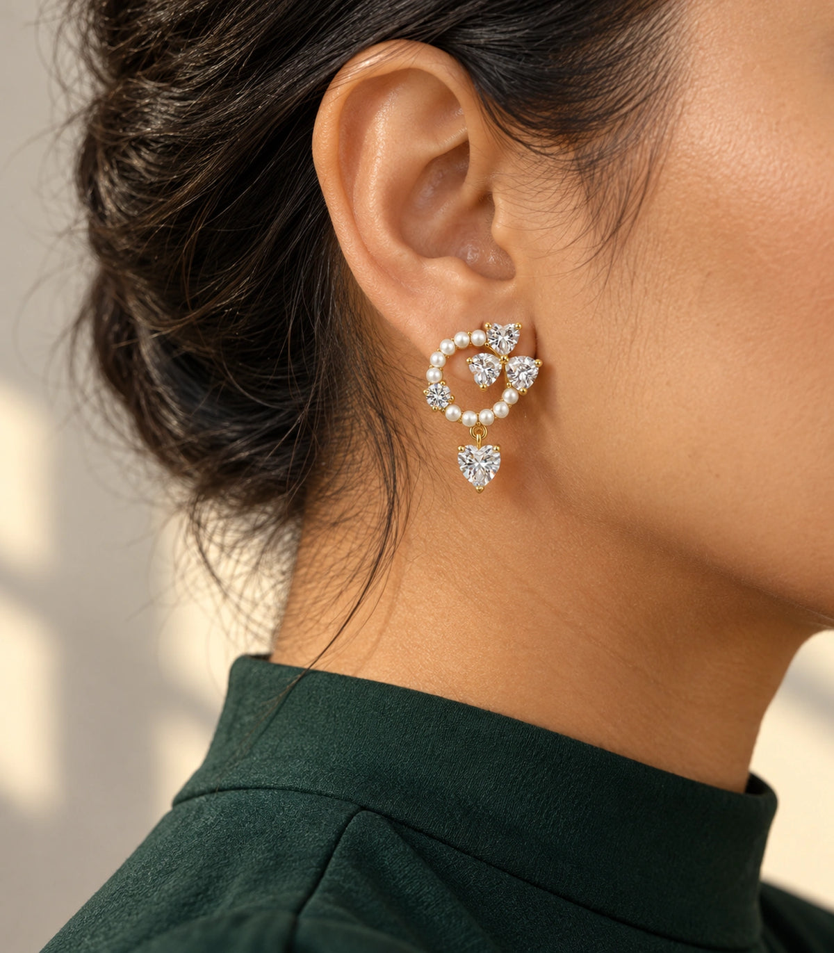 JIMIKI Pearl Ring Crystal Heart Drop Earring Pair in Gold tone / white, editorial model view #color_gold tone / white
