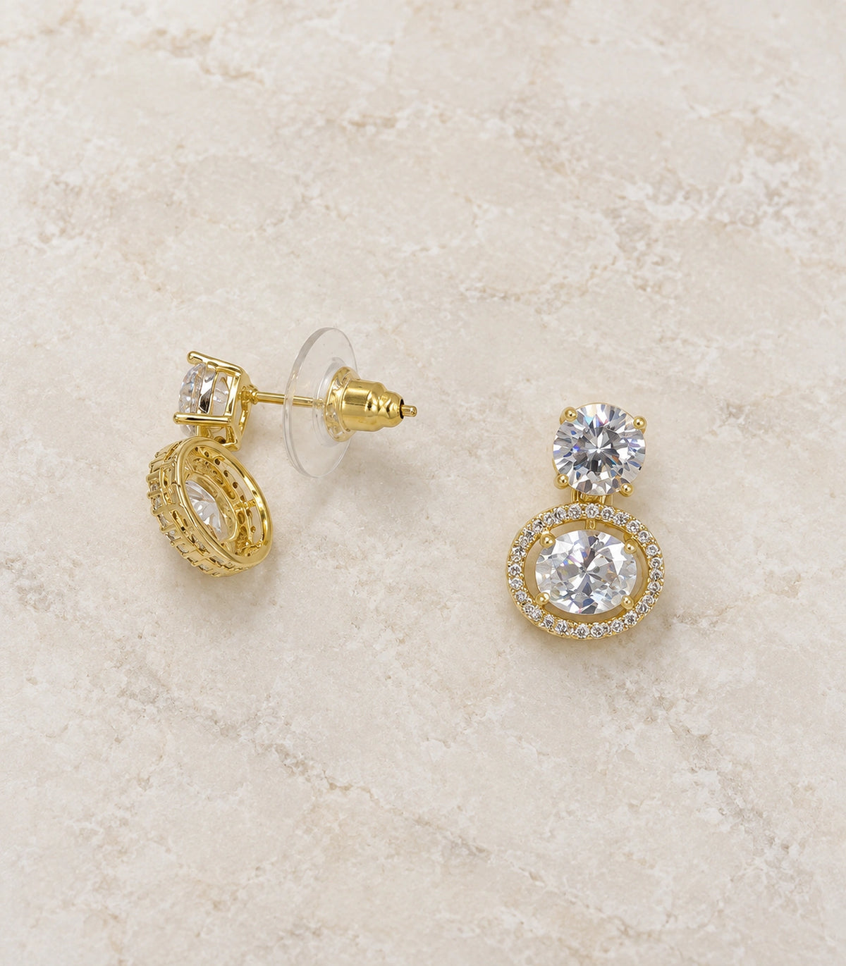 JIMIKI Gold Tone Round Crystal Halo Drop Earring Pair in Gold-tone, editorial flat lay