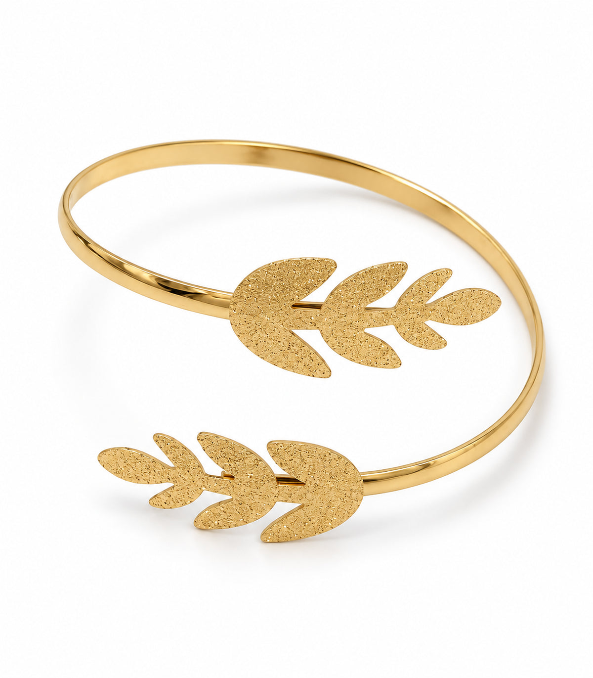 Gold-tone open arm cuff with two opposed textured seven-lobed leaf sprigs, complete product on white