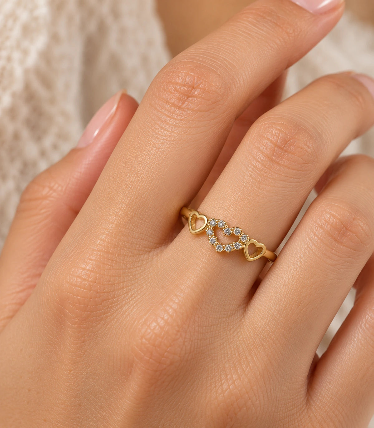 JIMIKI Triple Heart Crystal Adjustable Ring in Gold Tone - close-up details #color_gold-tone