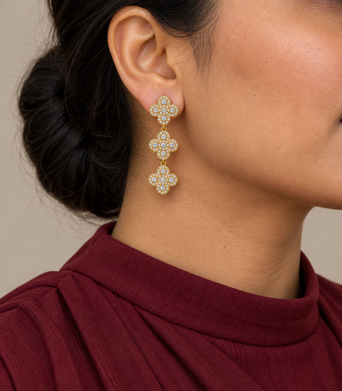 JIMIKI Pave Triple Quatrefoil Drop Earring Pair in Gold tone, model wearing view #color_gold tone