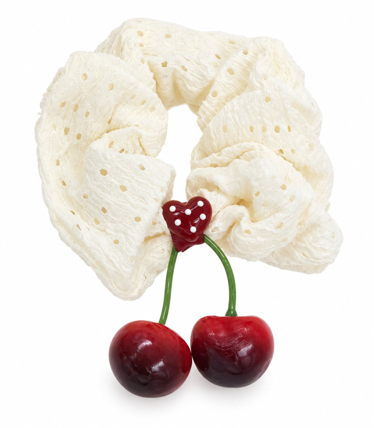 Ivory eyelet cherry scrunchie with dotted heart centre — white background view