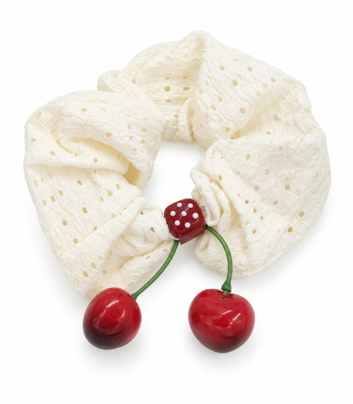 Ivory eyelet cherry scrunchie with dotted square centre, white background