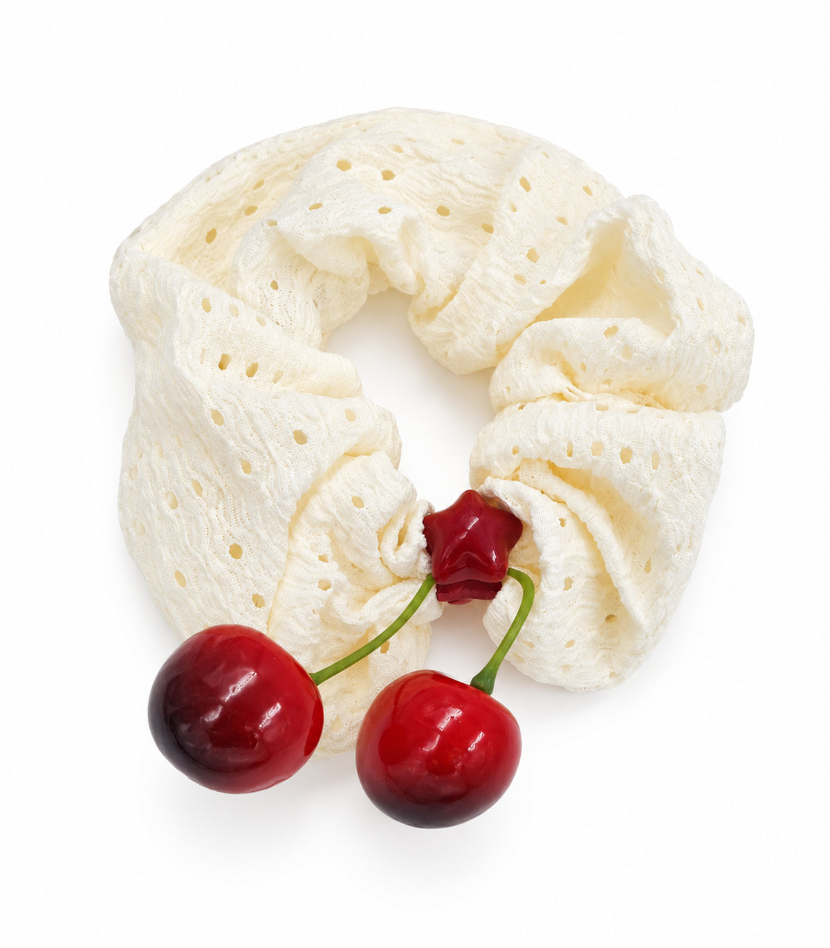 Ivory eyelet cherry scrunchie with red star centre — white background