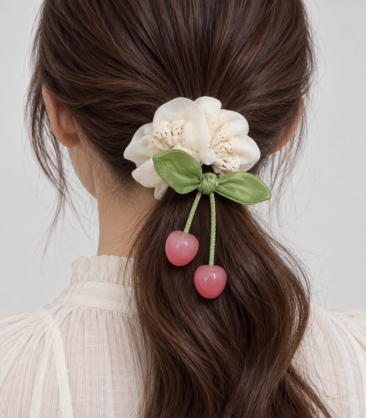 JIMIKI Lace Scrunchie With Cherry Charms in Ivory, model wearing view #color_ivory
