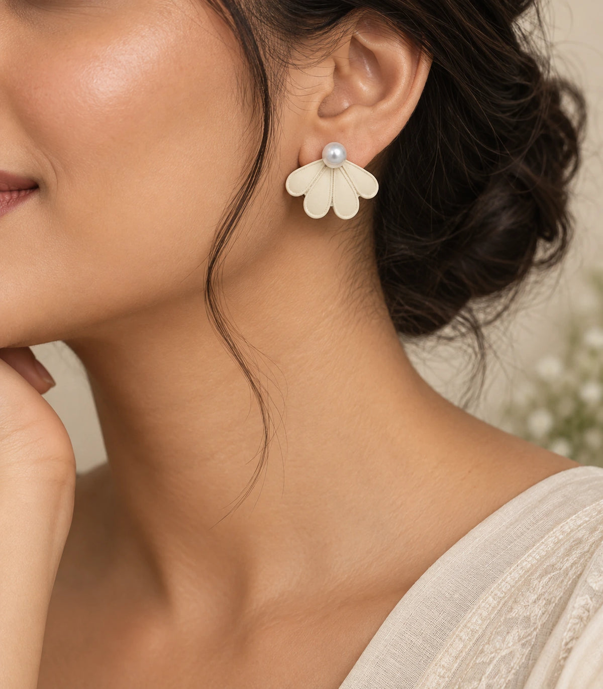 JIMIKI Ivory pearl fan petal stud earrings, styled worn editorial view #color_ivory
