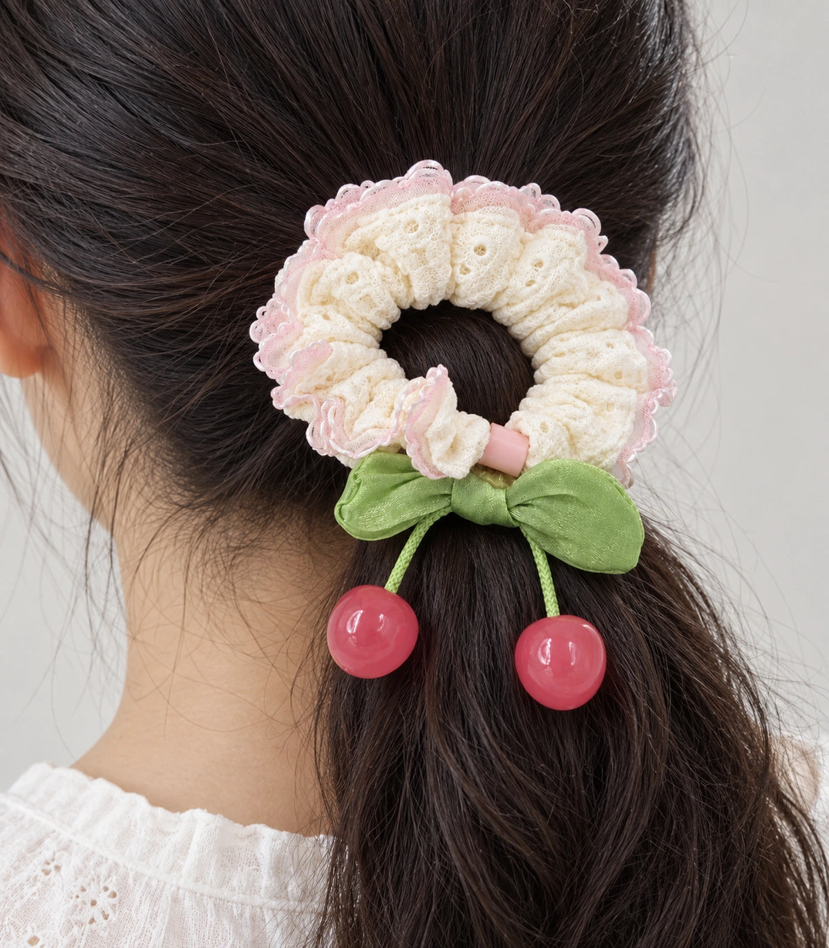 JIMIKI Ivory Pink-Trim Lace Cherry Scrunchie in Ivory/Pink/Green, close-up detail