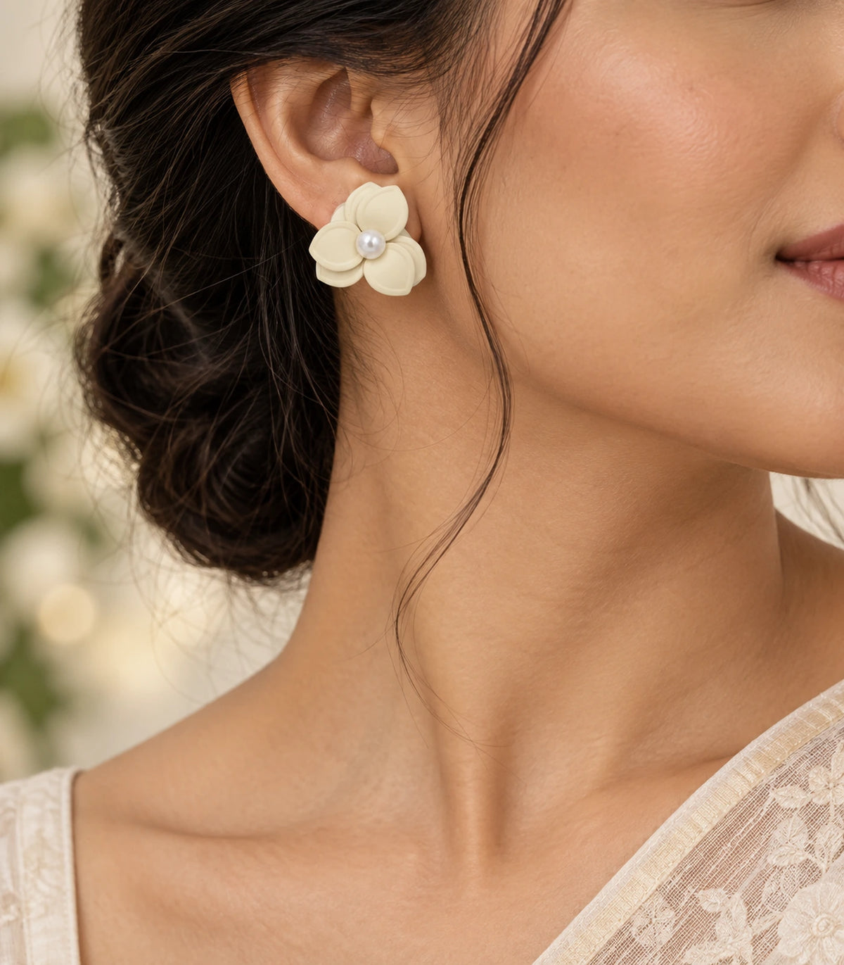 JIMIKI Ivory Triple Petal Pearl Flower Stud Earrings - one complete ivory earring in editorial styling #color_ivory
