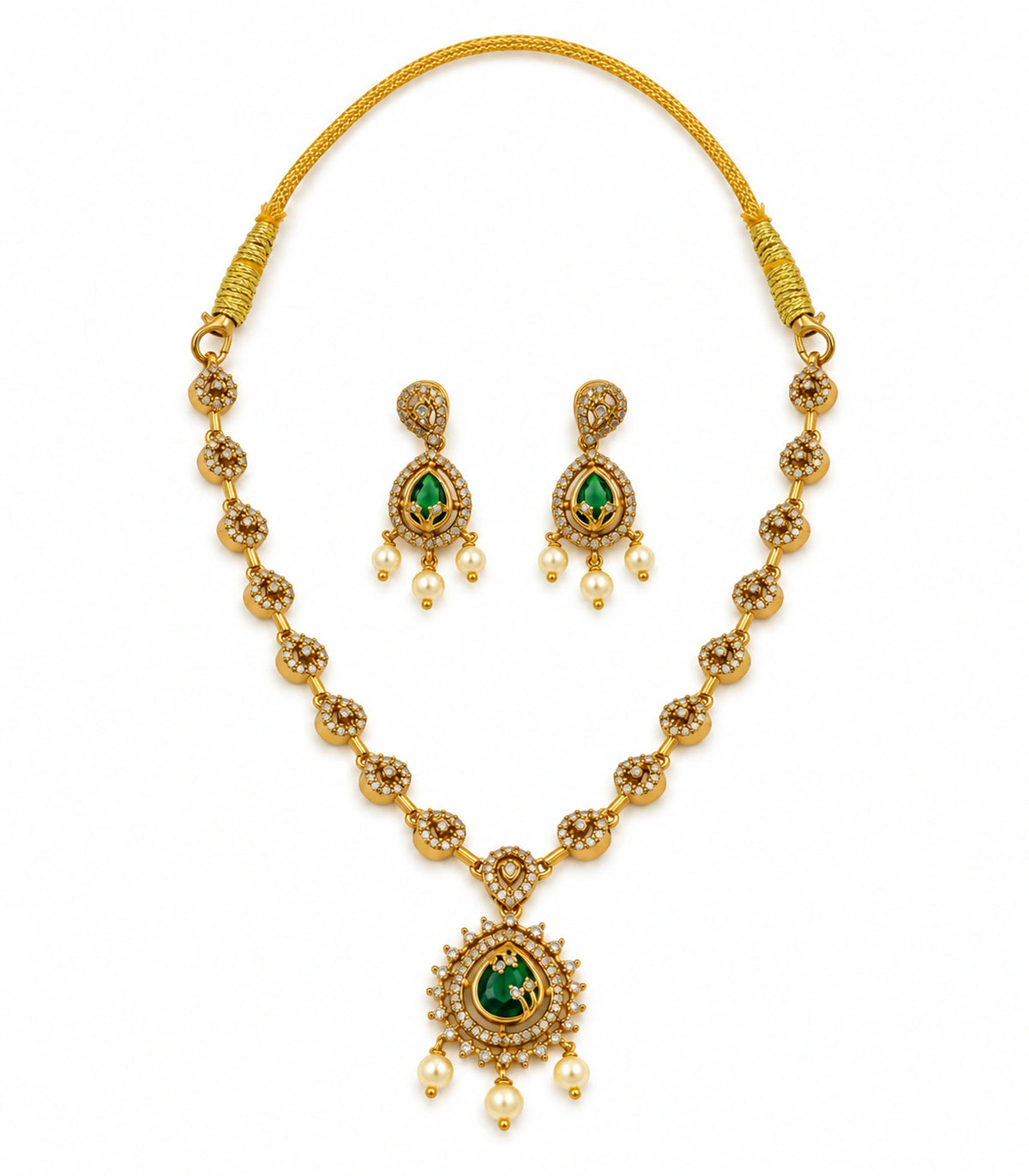 Gold-tone green teardrop necklace and two matching earrings with pearl-style drops on white background
