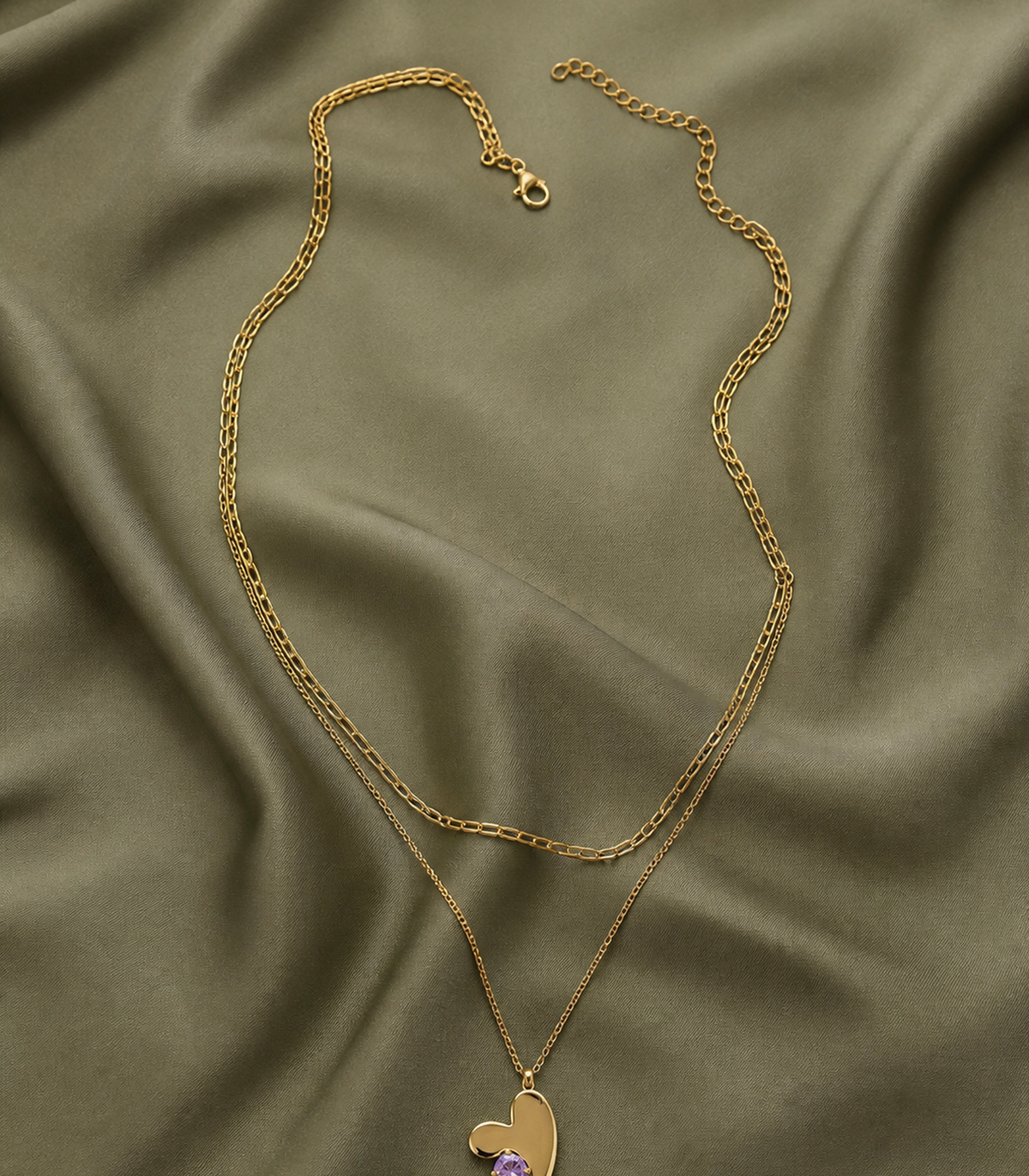 Lavender Crystal Layered Heart Necklace styled in a flat lay