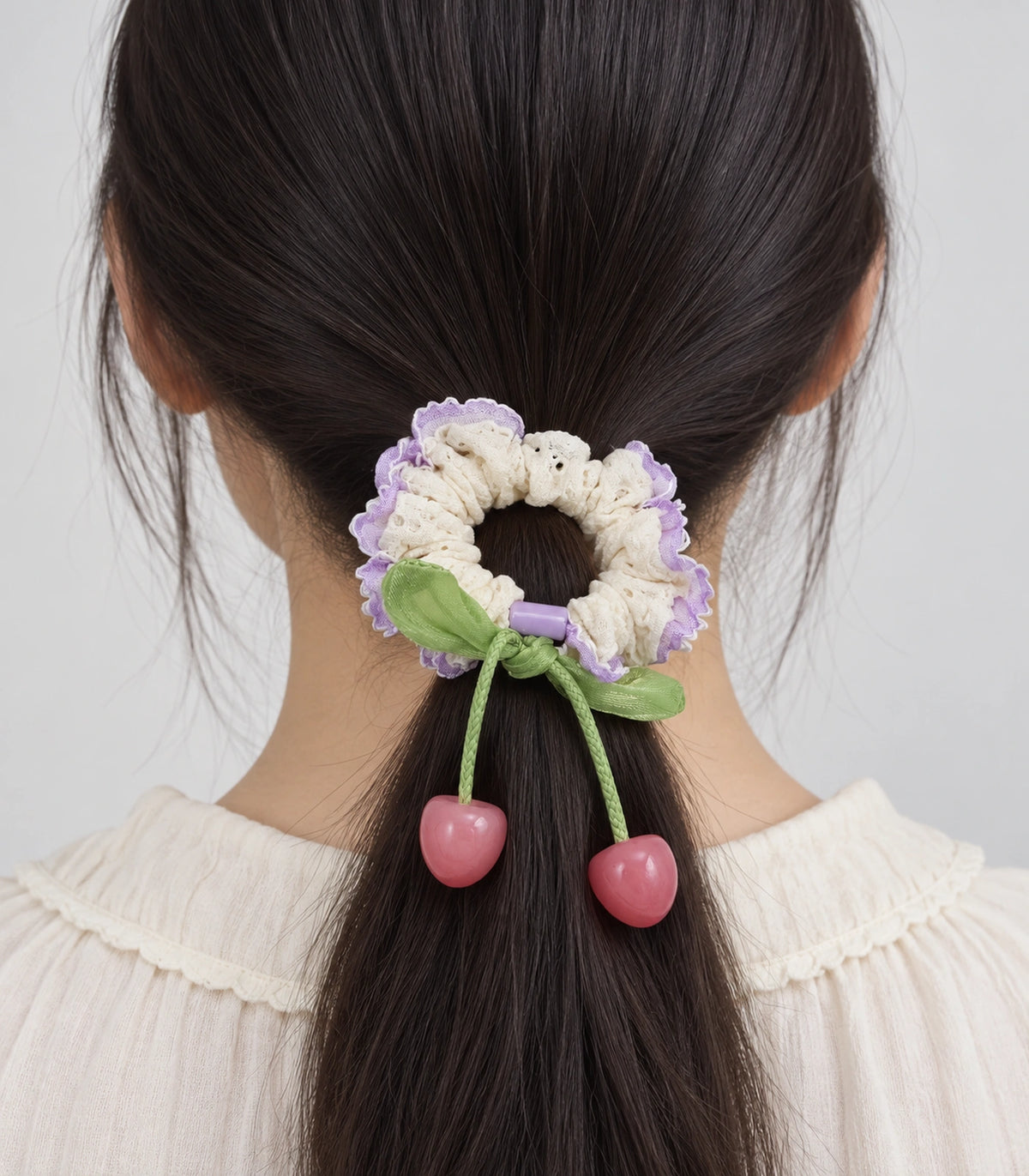 JIMIKI Trim Lace Scrunchie With Cherry Charms in Lavender Trim, model wearing view #color_lavender trim
