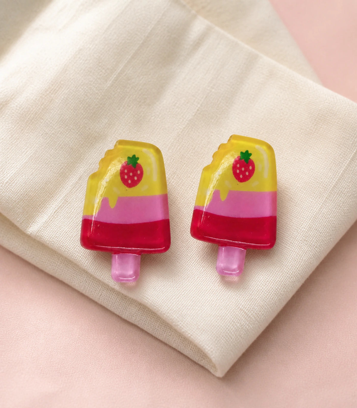 Editorial flat lay of the Layered Strawberry Popsicle Clip Pair