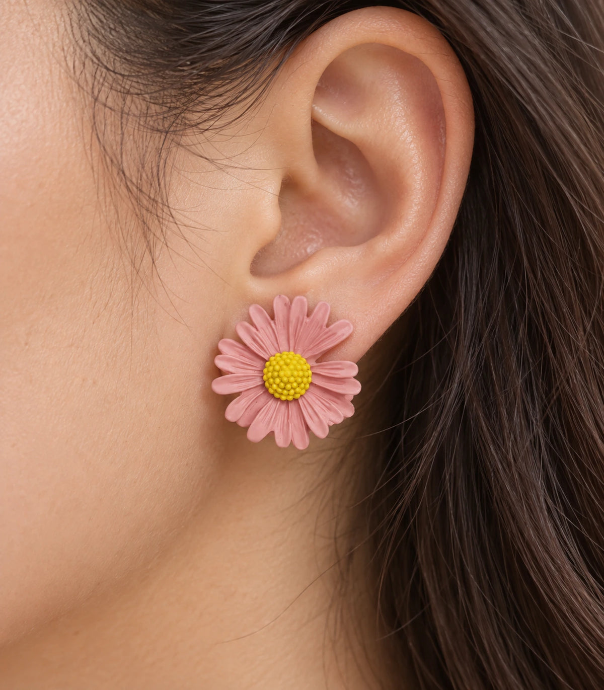 JIMIKI Light Pink yellow centre daisy stud earrings, close-up of grooved petals and yellow centre #color_light pink